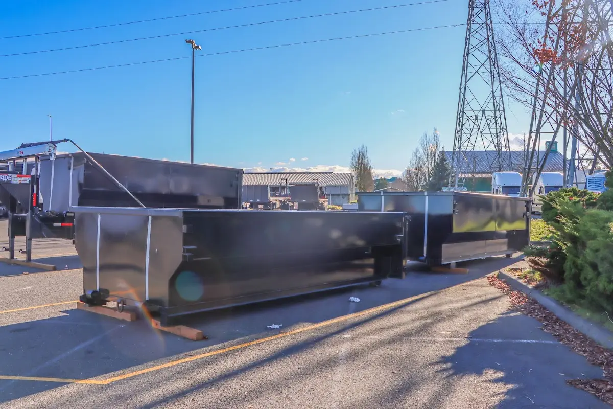 Roll-off dumpster ready for waste disposal at job site for Yard Waste Dumpster Rental in Highland Heights
